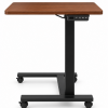 Electric height-adjustable overbed table with walnut top and black frame